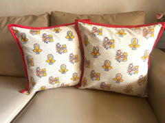 Madhubani: Yellow Orange Diya Cushion Covers